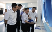 自治区海洋局局长玉彤一行到学校调研交流